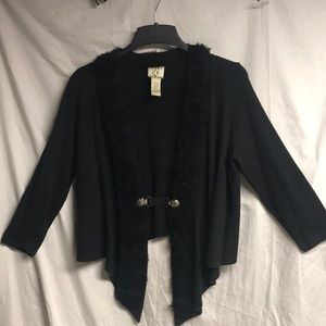 See picture for brand & details. Three-quarter length-long sleeve. Size large.